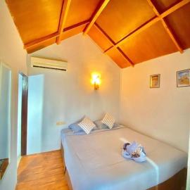 Poetri Bungalow standart room, ξενοδοχείο σε Mantaak