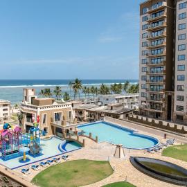 Sandy Shore Beach Apartments - Karibu Quarters, hotel sa Kikambala