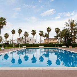 Apartamento con terraza, vistas al jardín y piscina, junto a playa y golf, hotel sa Grao de Castellón