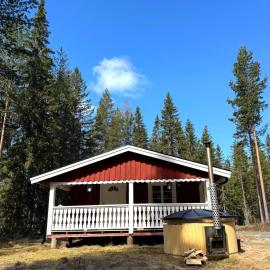 Luxe cabin in Hovfjället with Hot Tub โรงแรมในทอร์สบี