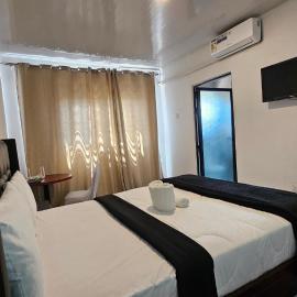 Malbon Green Executive Plus Lodge: Kafue şehrinde bir otel