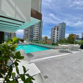 Modern 2 Bedroom Condo with Pool, gym, Wi-Fi.