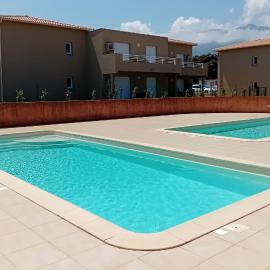 Maison bord de mer a Cervione dans résidence Torra Mare à 20221 Prunete avec piscine collective copropriétaire et ventilateur mobil dans toutes les pièces, hotel in Cervione