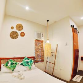 Tropico Inn Siargao: Siargao Island şehrinde bir otel