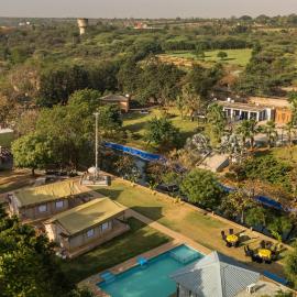 StayVista at Kaimalgarh Aravalli Estate with Pool, Lake & views of Aravalli Hills