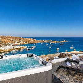Mykonos Psarou Place with Private Jacuzzi, hotelli kohteessa Psarou