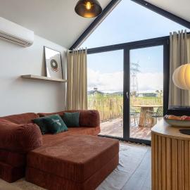 Tiny house with a fenced garden in Oud Ade - Garden shed - 8, hotel sa Oud-Ade