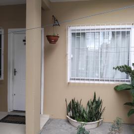 EM CASA