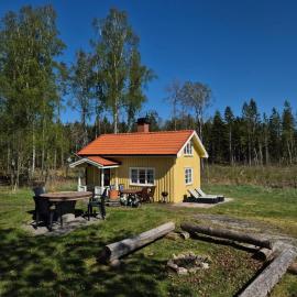 Dalslands-torp nära vattnet โรงแรมในเมลเลอรุด