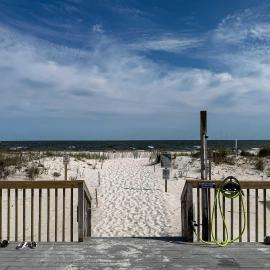 Spacious condo with views of the gulf near beaches features shared pool