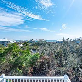 Two-story home with WiFi partial ocean views covered deck dock and W&D