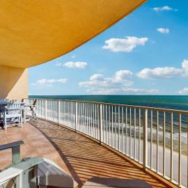 Gulf-front condo with panoramic views balcony & shared pool hot tub gym