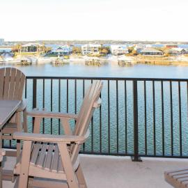 Coastal escape with 2 water-view balconies 2 pools tennis & beach access