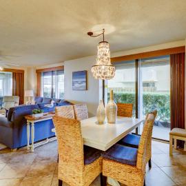 Inviting coastal-chic beachfront condo with pool hot tub and tennis
