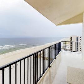 Gulf-front corner condo with wraparound balcony pools beach access