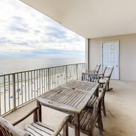 Beachfront condo with Gulf view balcony pools hot tubs & gym access