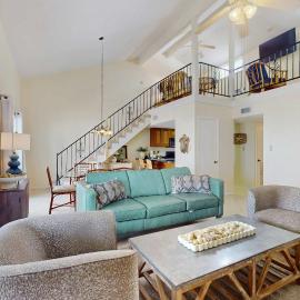 Stylish beachfront condo with ocean views balcony pool access & grill