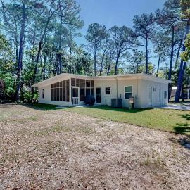 Modern dog-friendly home in the heart of island with hot tub & screened lanai