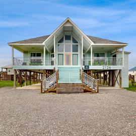 Two-story dog-friendly home with partial ocean views decks private washer dryer