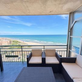 First-Line Beachfront Penthouse, Terrace, and Ocean Views, Hotel in Faro de Cullera