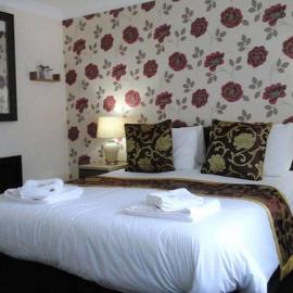 Maen Hir Guest House, hotel u gradu Llandegfan