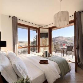 Elegant Penthouse LA BALCONATA - Wellness Retreat & Castle View, hotell i Tabiano