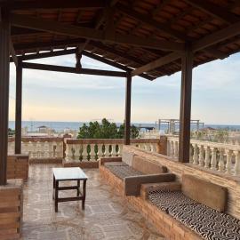 villa with private garden and roof 3rd row from the sea in reveira beach village 59km, ξενοδοχείο στην Μποργκ Ελ Αράμπ