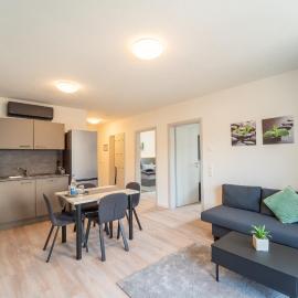 Aparthotel Neckartal - Premium Serviced Apartments mit je 2 Schlafzimmern & King-Size-Betten, Highspeed-WLAN, 55'' Smart-TV in jedem Zimmer, Vollküche, Klima, Parkplatz - 15 Min nach Stuttgart, Ludwigsburg & Waiblingen - Perfekt für Business & Privat!, hotel v destinaci Remseck-Pattonville