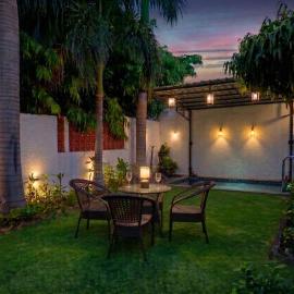 StayVista at House of Palm with Bonfire & Pool