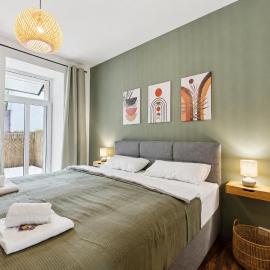 Gemütliches Apartment - hochwertiges Boxspringbett, privater Parkplatz, Terrasse, komplette Küche, WLAN, 40 Zoll HD TV