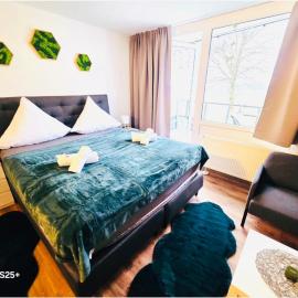 Ferienwohnung Harmonia inklusive Hallenbad, Außenpool, Sauna & Fitnessstudio, familienfreundlich ausgestattet, großes 2-Zimmer-Apartment