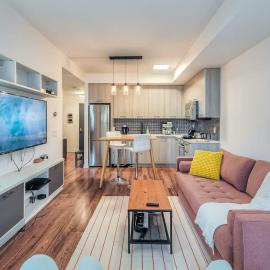 Modern Downtown Condo with Workspace & Balcony