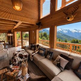 Chalet de Luxe avec Piscine Intérieure et Sauna - Vue Montagne Manigod, hotell i Manigod