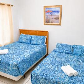 SUITE 1, BLUE PAVILION - Steps to BEACH - NEW AC, hotel in West Bay