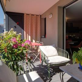 T3 2 chambres avec balcon et place de stationnement