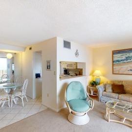 Sea Colony 2nd floor condo with free WiFi shared tennis court & sauna with an ocean view