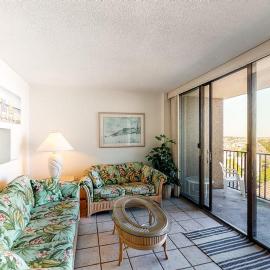 Sea Colony 6th floor condo with shared gym basketball court with an partial ocean view