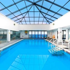 Beautiful condo in oceanfront complex featuring pools