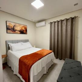 Casa Nova, 2 quartos, 1 Ar-Cond, 1 Banheiro, Garagem 4,30m, hotel in Montes Claros