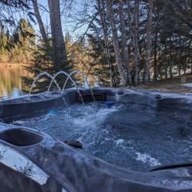 Riverfront Getaway with Hot Tub and Scenic Views