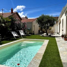 Charmante maison de ville avec piscine plein sud