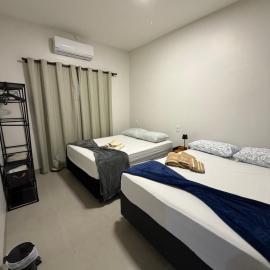 Casa aconchegante com 02 quartos climatizados, hotel em Nova Mutum