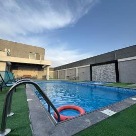 aqua chalets شاليهات أكوا, hotel i Al Rama