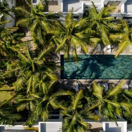 Chic poolside haven 3BR steps from the beach