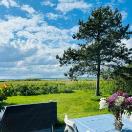 Log Cabin In The Front Row Overlooking The Sea