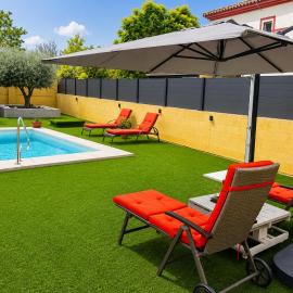 Casa Andaluza con piscina y jardín privado en Gelves a 15 minutos del centro de Sevilla, hotel in Gelves