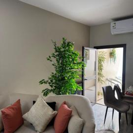 Luxury 3-bedroom apartment with a balcony and a direct view of Olaya Street
