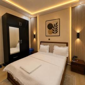 KIGALI E6 APARTMENT WITH SWIMMING POOL AND TOUR SERVICEs, hotel em Kigali