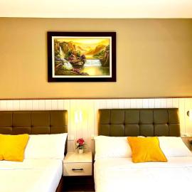 Twin Hearts Residence 1 by Dr Ron, Roxas City, Capiz, hotel in Lauaan