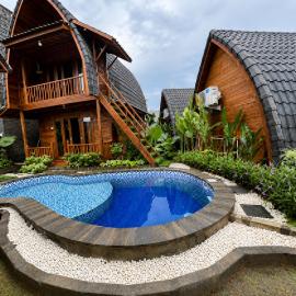 Cozzy De Ravin Village Bungalows Canggu, hotel en Dalung
